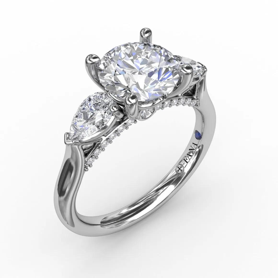 Classic Three-Stone Engagement Ring With Pear-Shape Side Diamonds