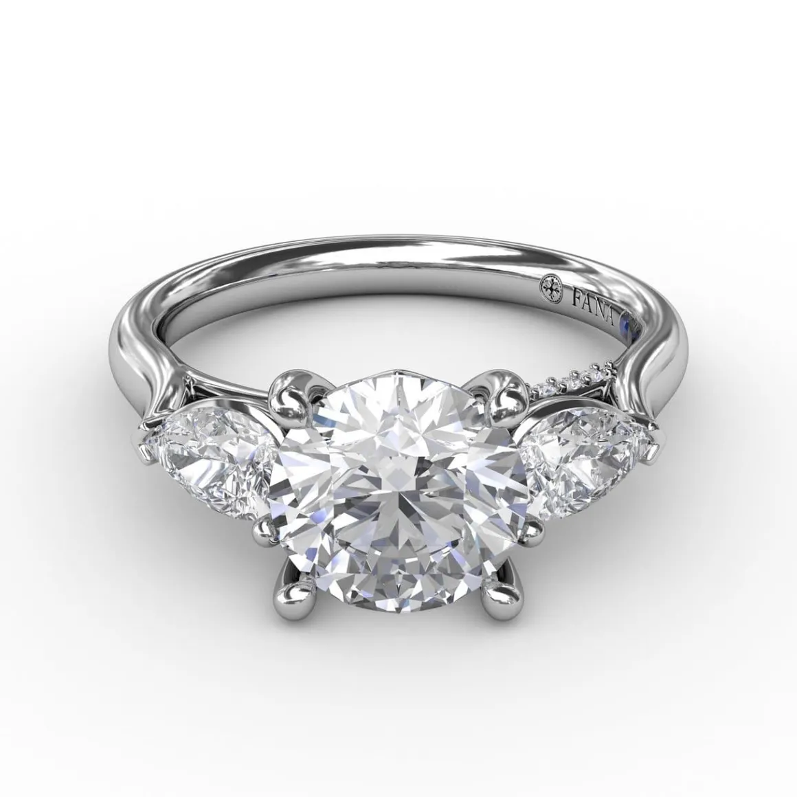Classic Three-Stone Engagement Ring With Pear-Shape Side Diamonds
