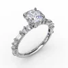 Contemporary Diamond Solitaire Engagement Ring With Baguettes and Round Diamond Accents